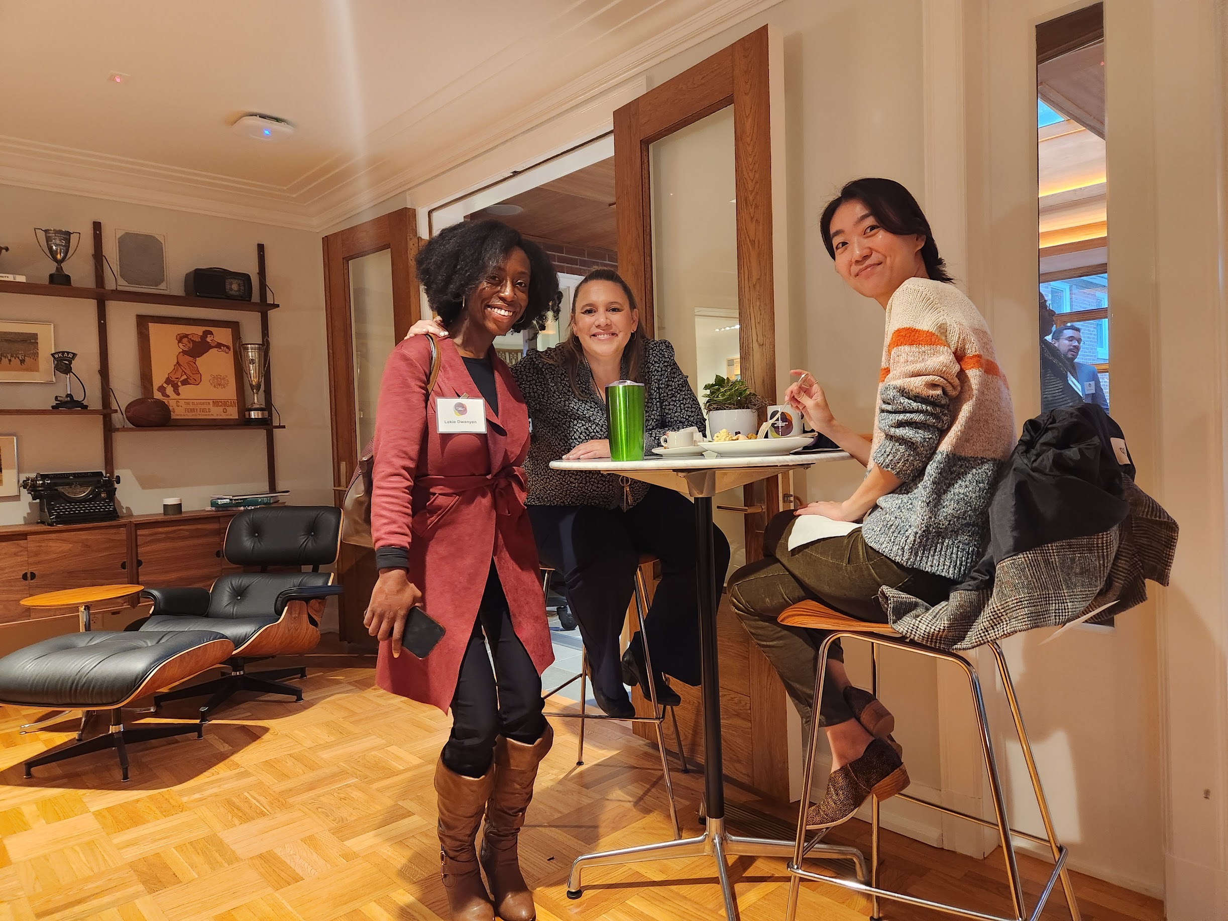 Participants gather around a table