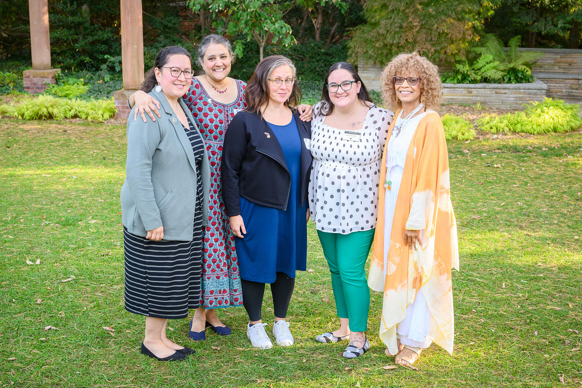 CoREM members take a group photo in the garden