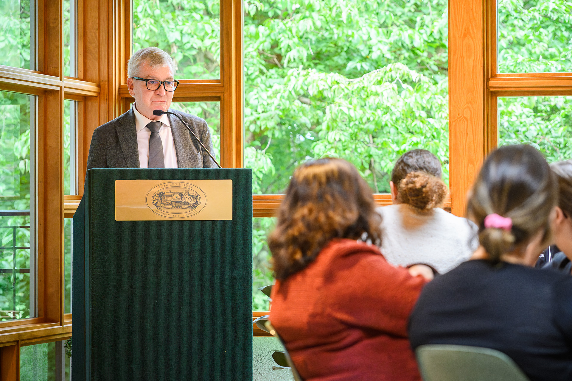 a speaker at the lectern