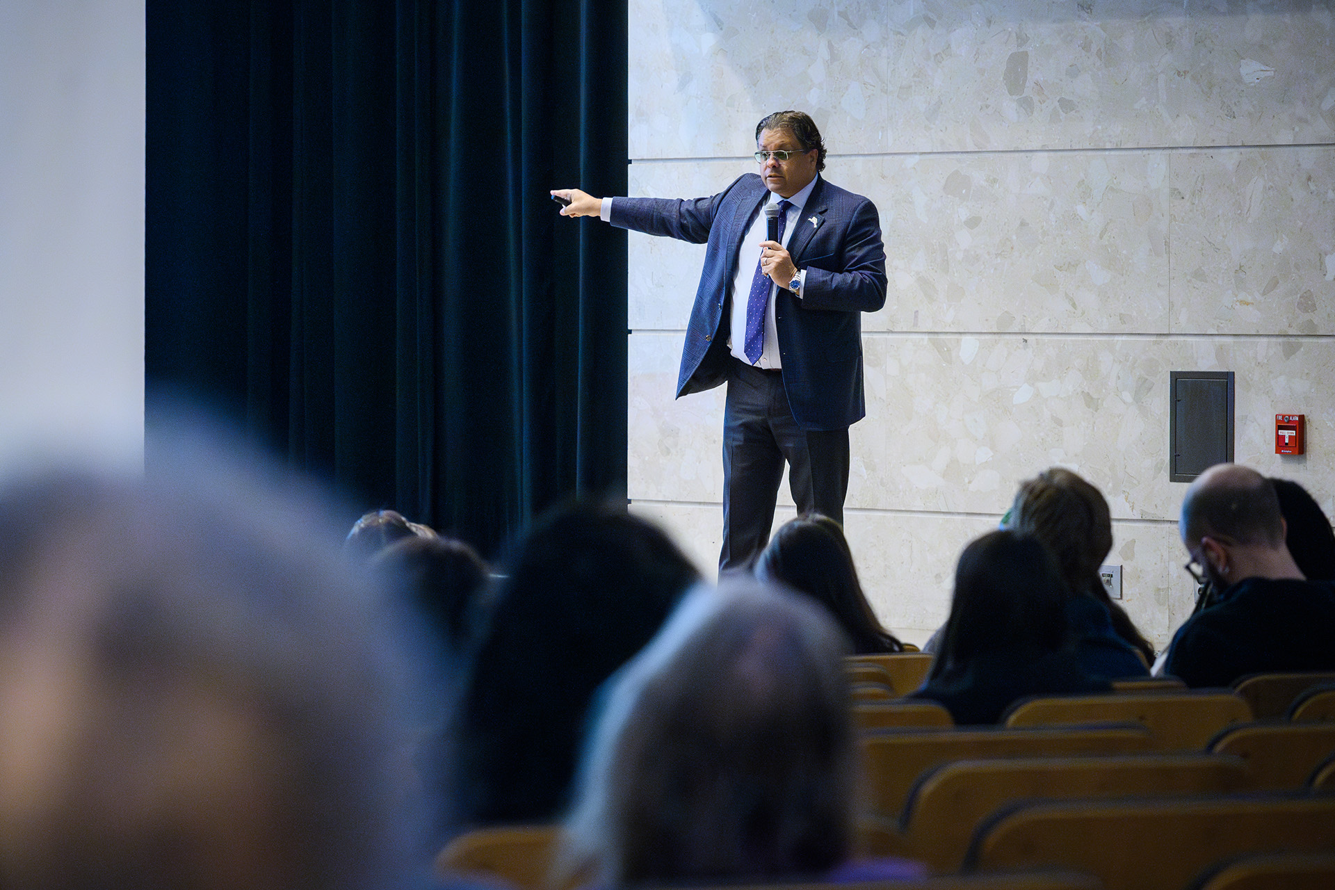 keynote speaker with audience in the foreground