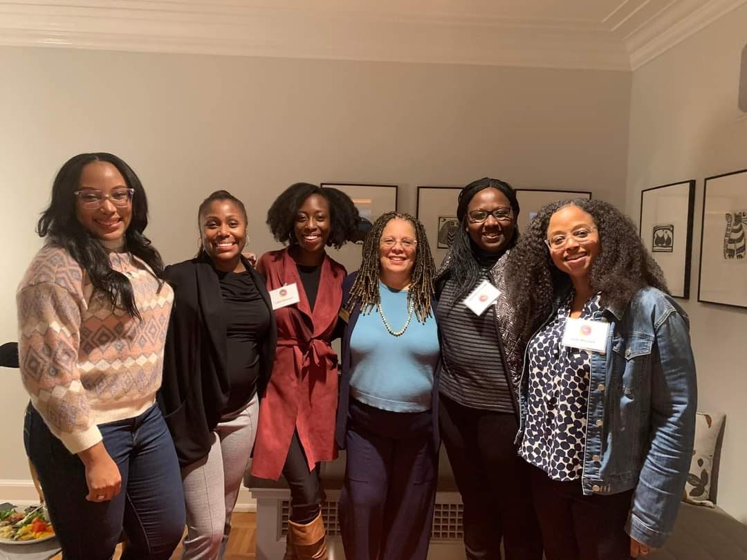 Group of scholars pose for a photo.