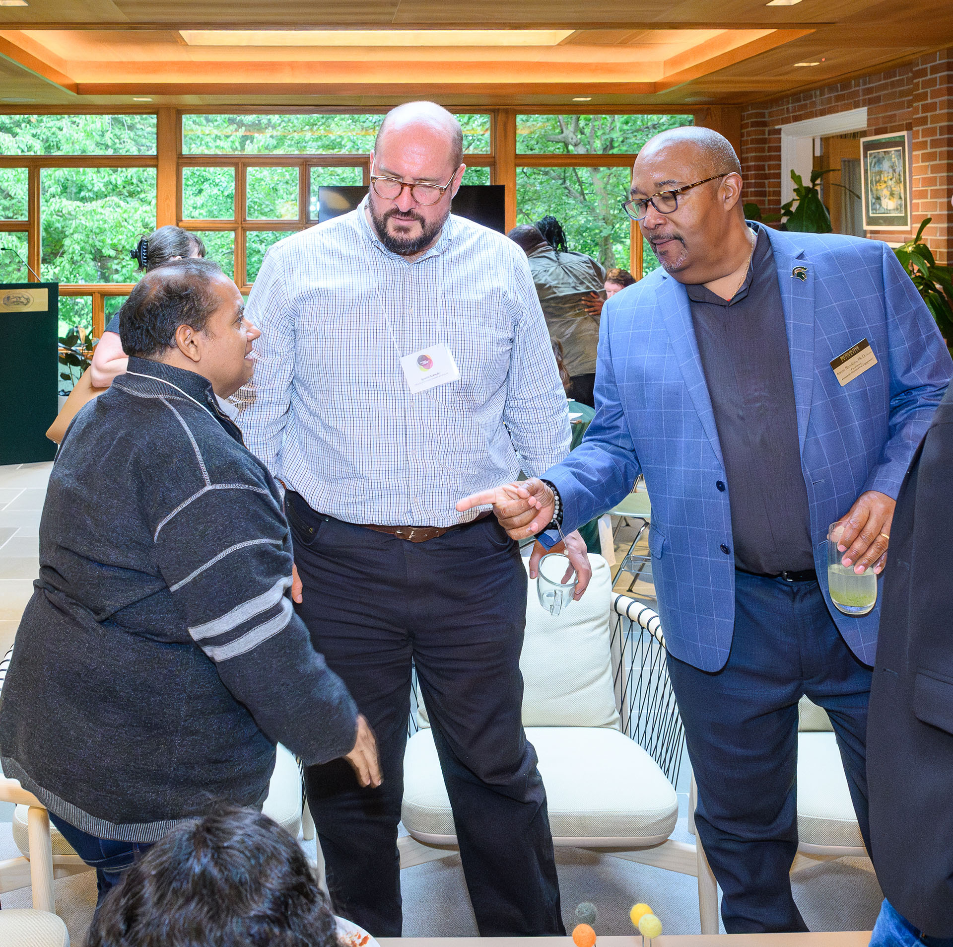 Three participants having a conversation